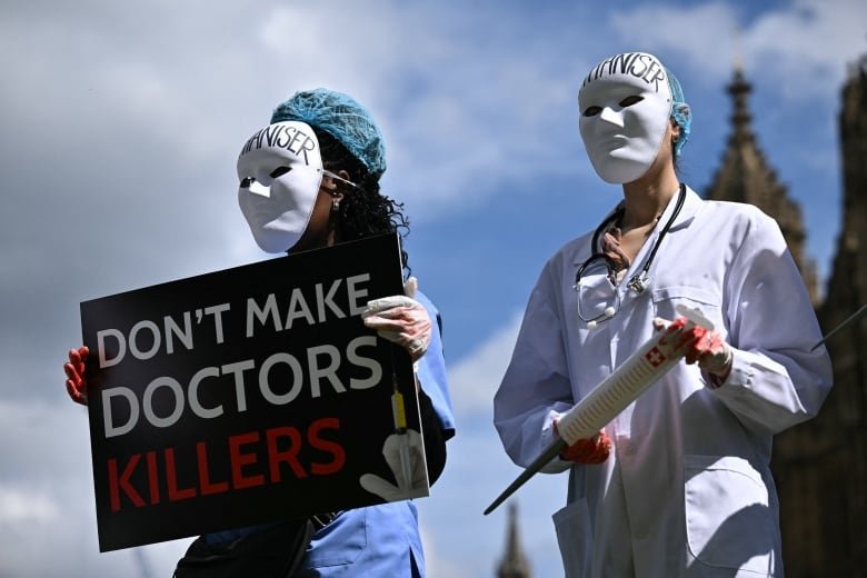 Disability campaigners from "Distant Voices and Not Dead" hold a demonstration outside Westminster Hall in central London, on April 29, 2024, protesting against proposals to legalise assisted suicide in the UK. Many fear legalization of assisted dying will send the wrong message, especially to those with disabilities.