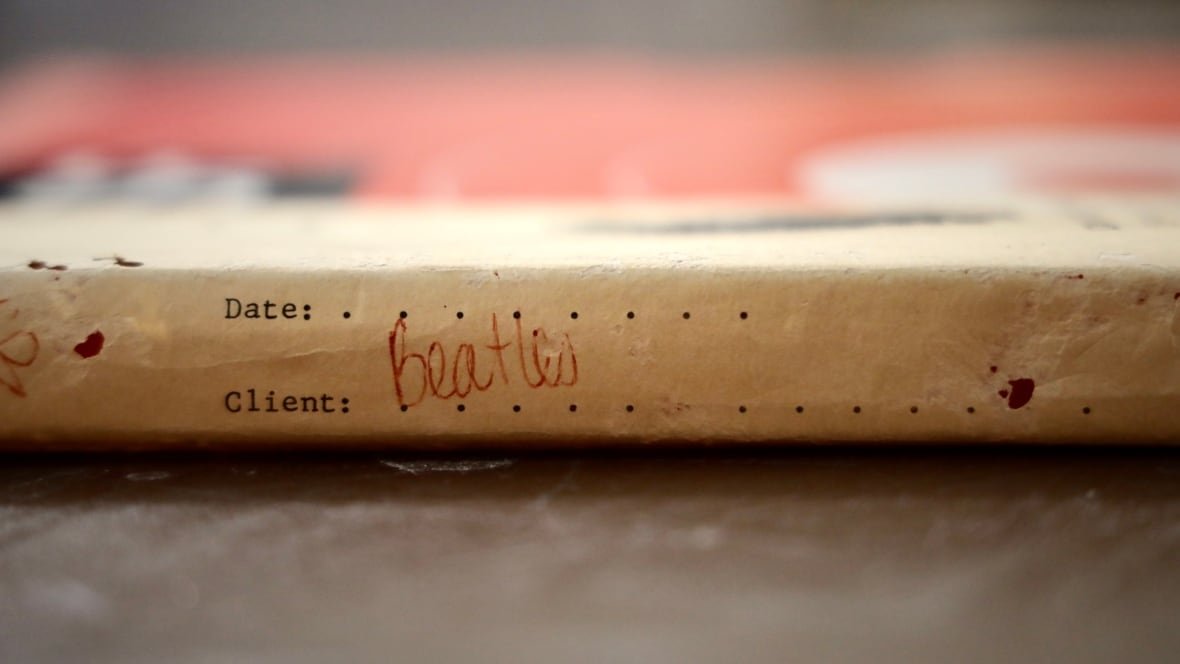 beatles-recording Brown paper packaging, close up, reads 'Beatles.'