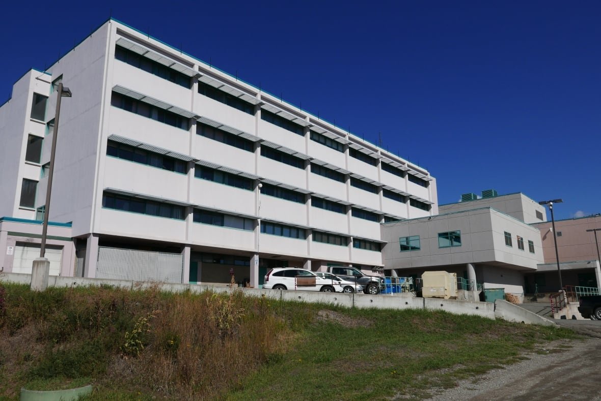 cariboo-memorial-hospital White rectangular building with cars out front.
