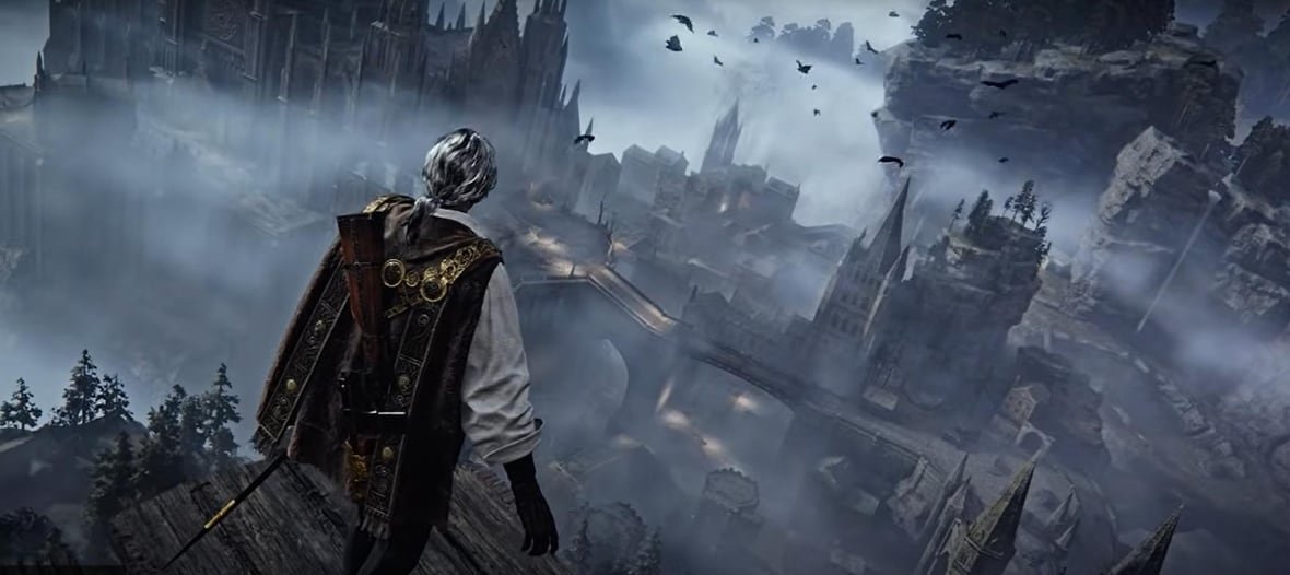 duskbloods A shot from a video game shows a man standing on a cliff overlooking a foggy and gloomy looking castle.