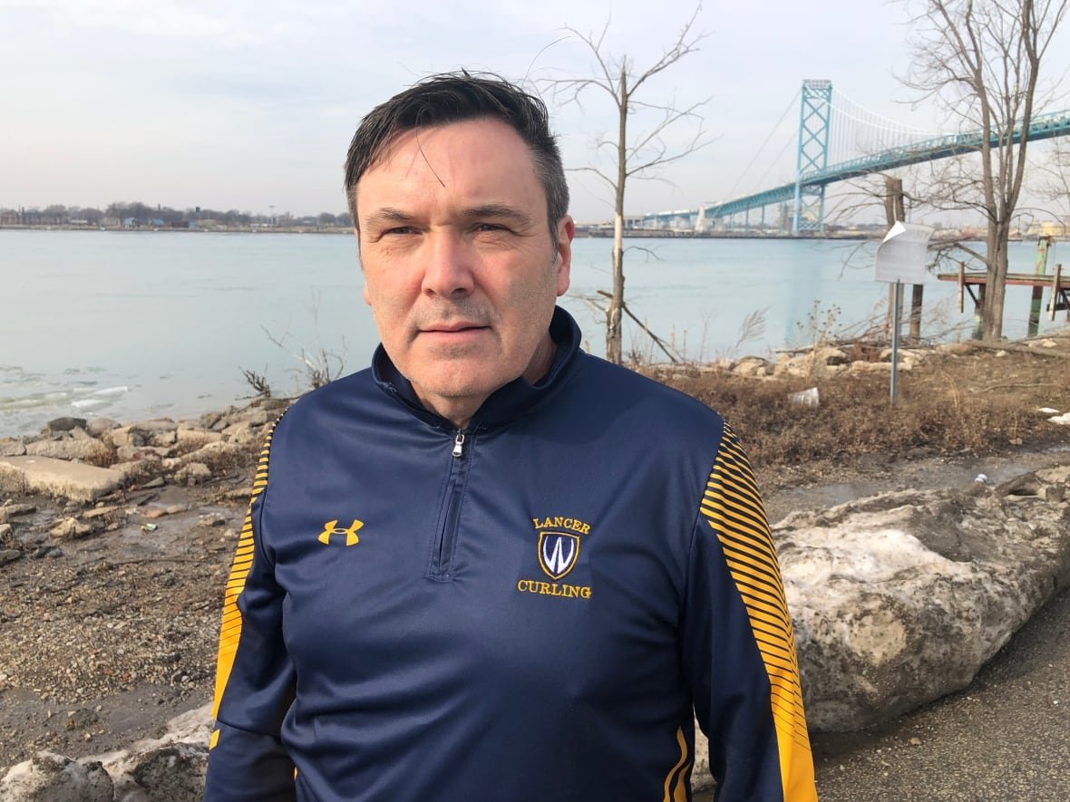 ice-levels Mike McKay, the director of the Great Lakes Institute for Environmental Research at the University of Windsor stands next to the Detroit River.