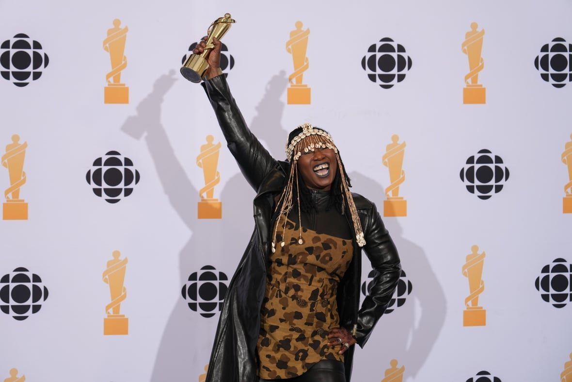 music-juno-awards-20250329-21 A person poses with an award.