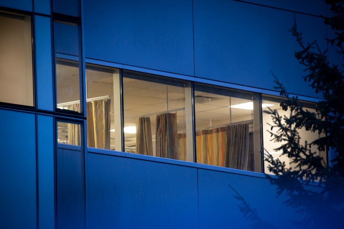patient-rooms A show of window from the outside that shows hospital curtains.