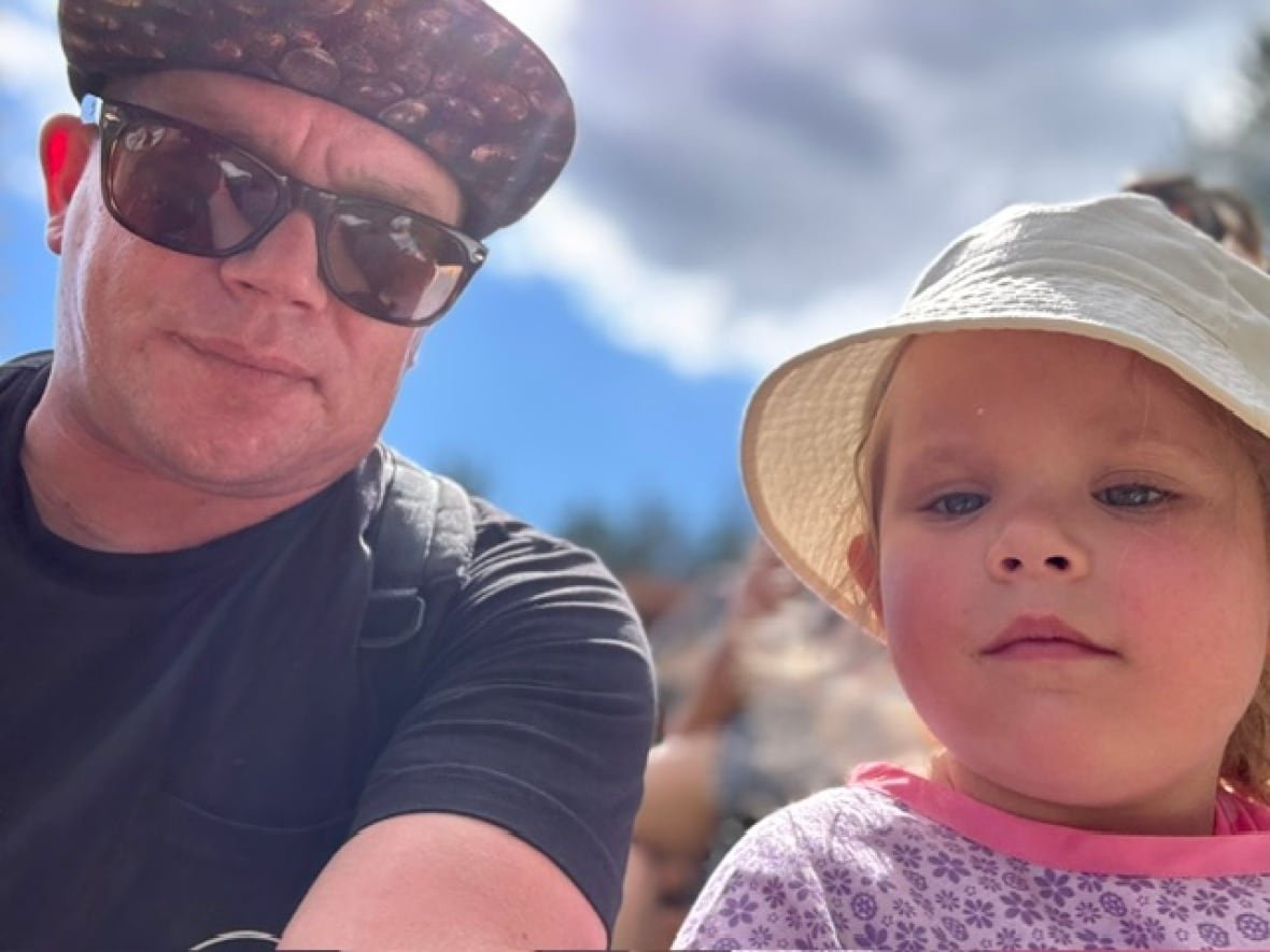 patrick-cully-and-scarlet A selfie of an adult with a young child.