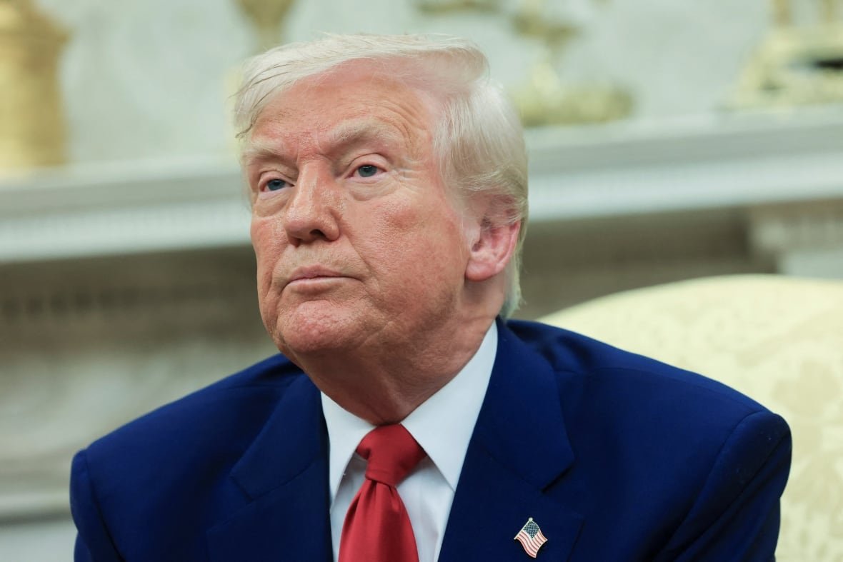 u-s-president-donald-trump-sitting-inside-the-oval-office A close-up view of U.S. President Donald Trump's face.