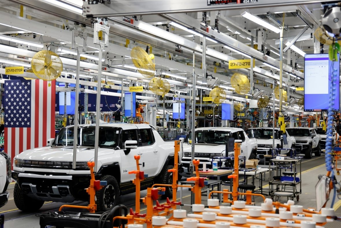 usa-biden-infrastructure Hummer EV are seen on the production line as U.S. President Joe Biden tours the General Motors 'Factory ZERO' electric vehicle assembly plant, in Detroit, Michigan, U.S. November 17, 2021. REUTERS/Jonathan Ernst