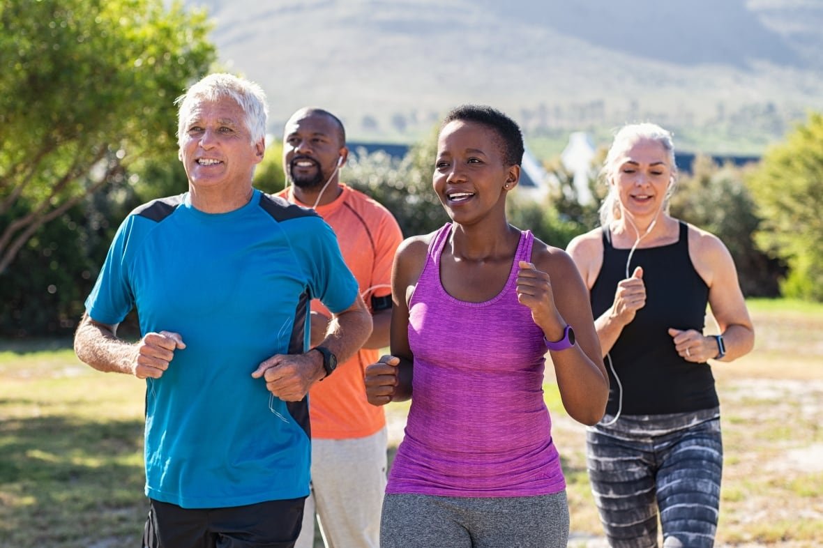 1439017070 Four people in athletic clothing jog