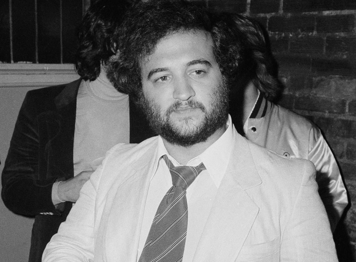 john-belushi-at-the-village-gate-in-new-york-on-july-27-1978 Man in beard and jacket and tie with cigarette