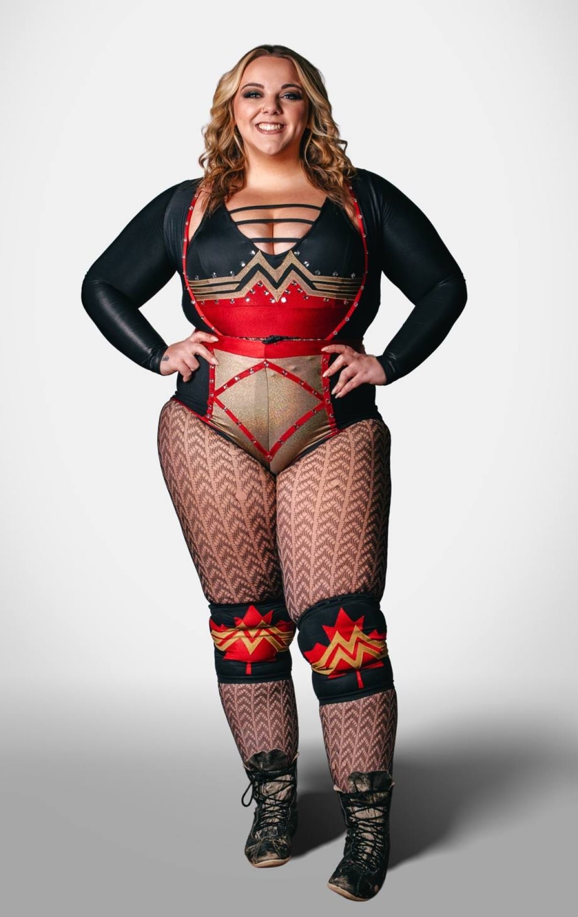 maddison-miles A professional wrestler with maple kneepads is shown in her costume.