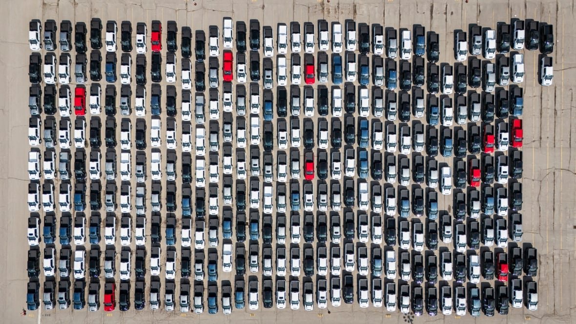 oshawa-gm-assembly-1 New pickup trucks await transport at the General Motors assembly plant, in Oshawa, Ont., on May 2, 2025.