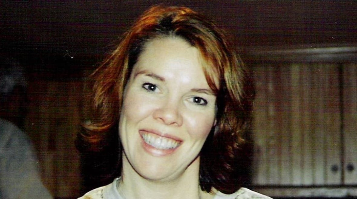 paula-gallant A woman with dark hair smiles at the camera.