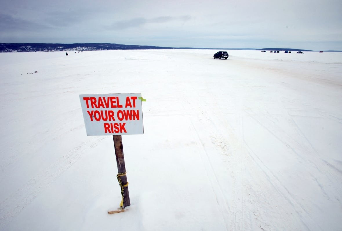 usa-weather-1 A car travels the ice road on Lake Superior between Bayfield, Wisconsin and Madeline Island February 15, 2014. According to the National Oceanic and Atmospheric Administration (NOAA) Great Lakes Environmental Research Laboratory, about 94% of Lake Superior is covered with ice. The Great Lakes, which contain one fifth of the world's surface fresh water, are 88% covered with ice. Picture taken February 15, 2014.