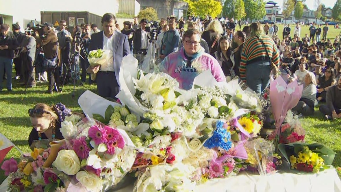vigil-for-lapu-lapu-festival-victims A temporary memorial at a park near Kensington Community Centre in Vancouver, where attendees placed flowers, cards, and handwritten notes.