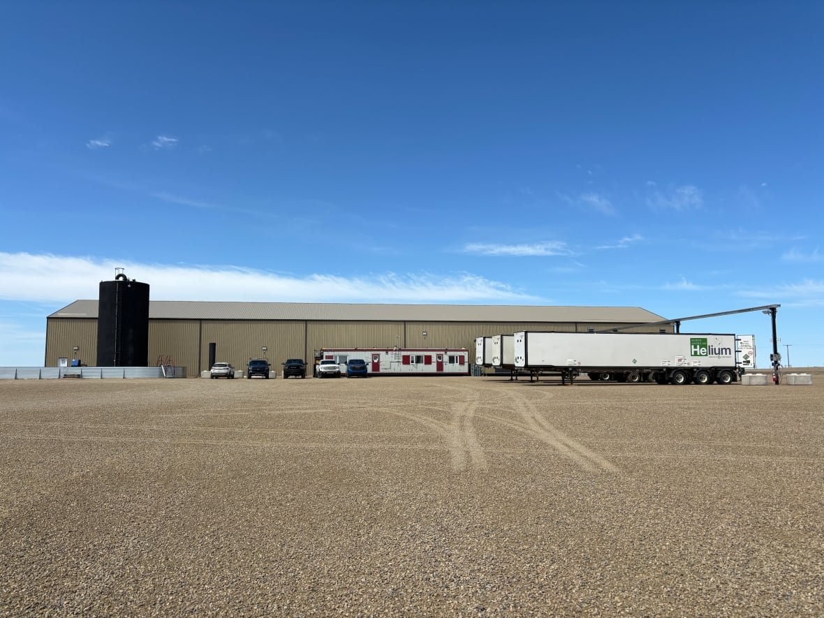 Large industrial building and trucks