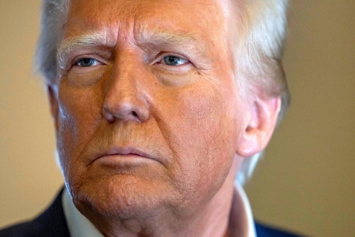 donald-trump-1 An elderly man with blond hair is seen in a close-up photo.