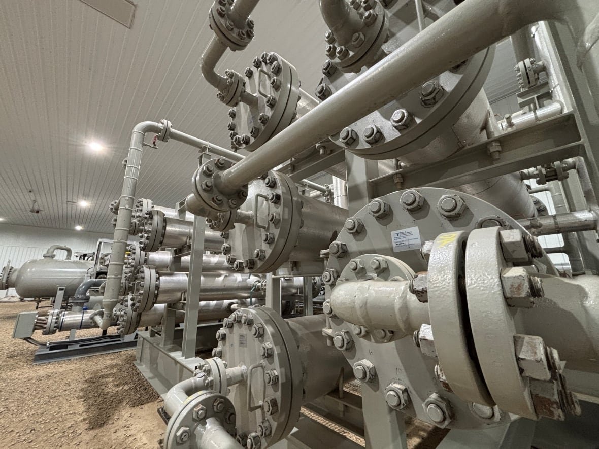 pipes, vessels and valves inside the purification plant