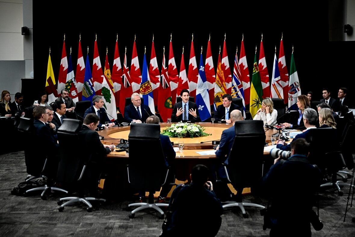 trudeau-premiers-20250115-3 People are seen seated at a roundtable.