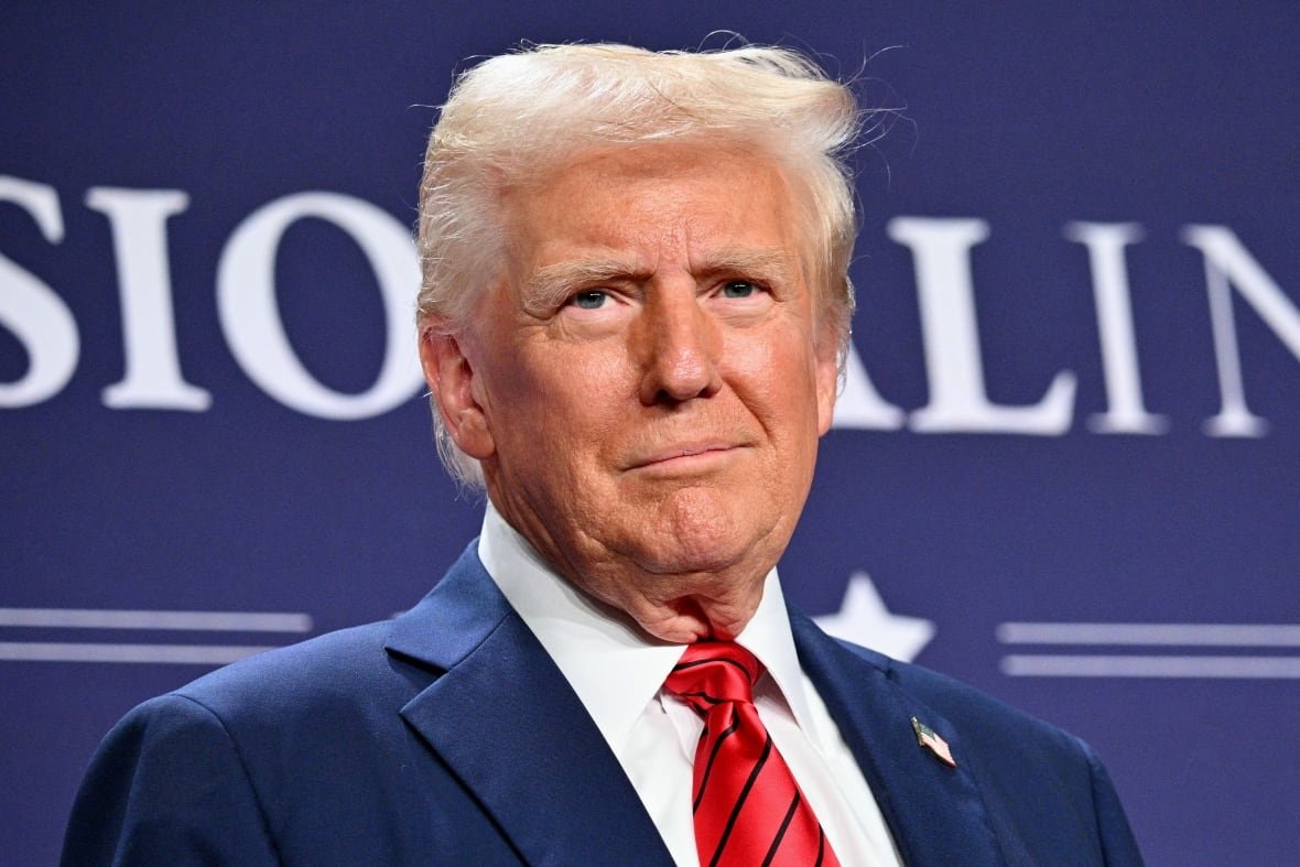 u-s-president-donald-trump-in-miami-fla U.S. President Donald Trump looking out from a stage.