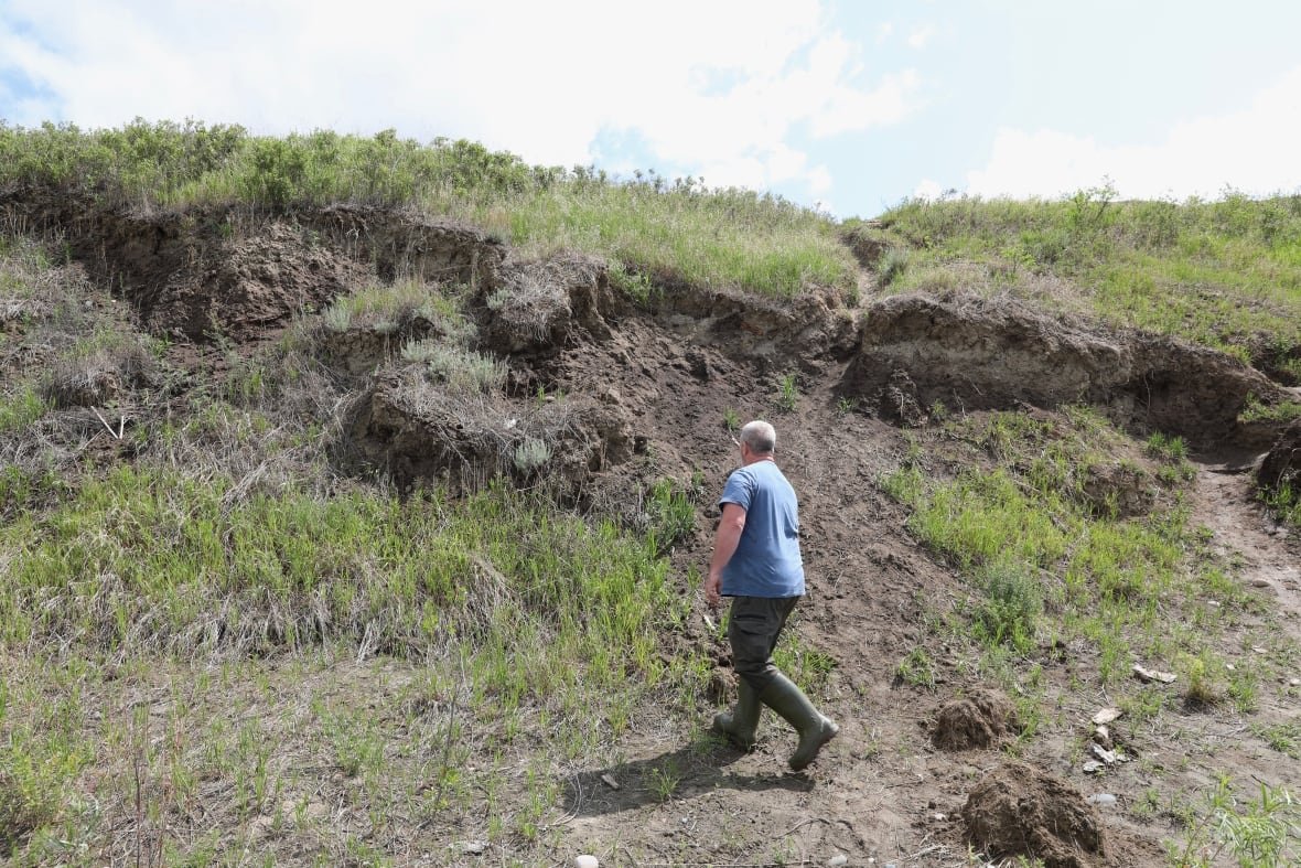 dave-rondeau-1 A man walking along a site in Saskatchewan