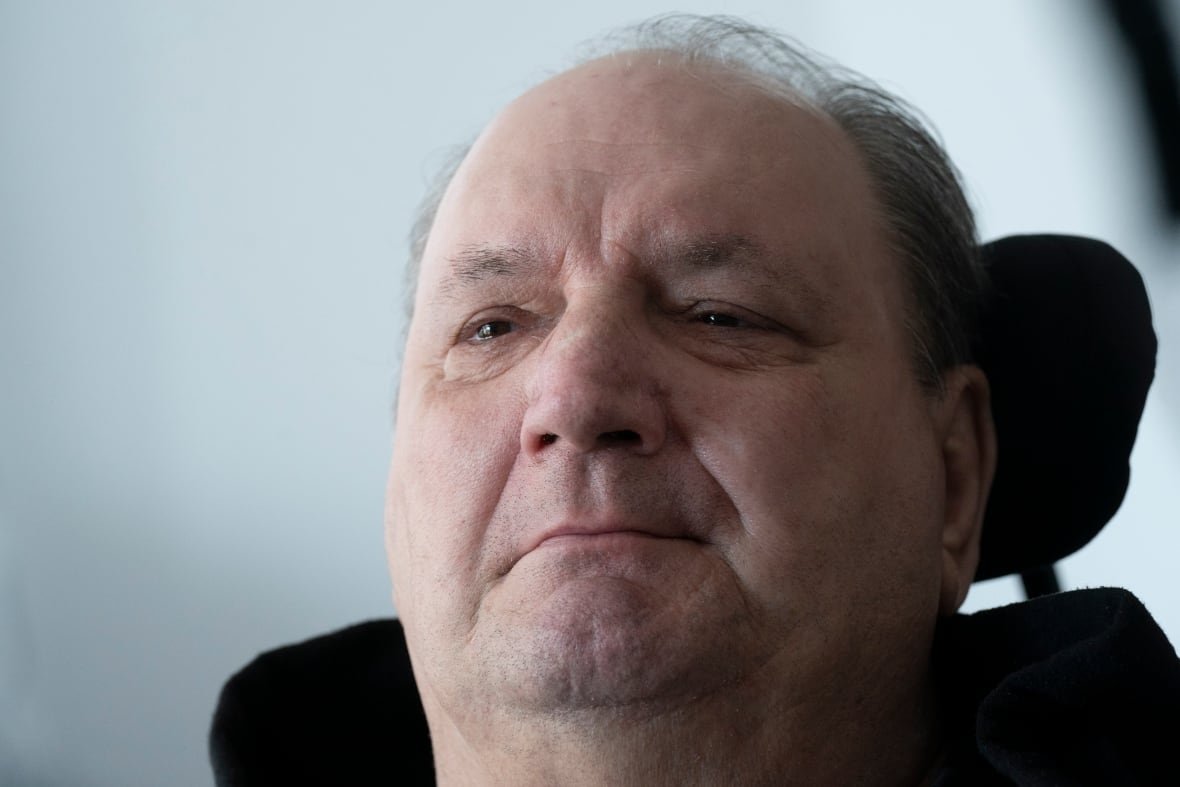 normand-meunier-1 A close up photo of a man's face
