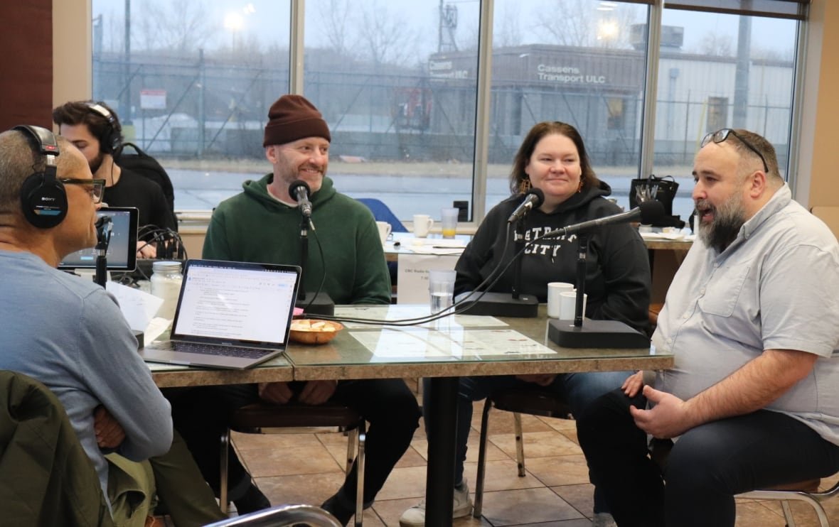 tom-lucier-jeanette-pierce-rino-bortolin Three people sit at a table, talking to a radio host.