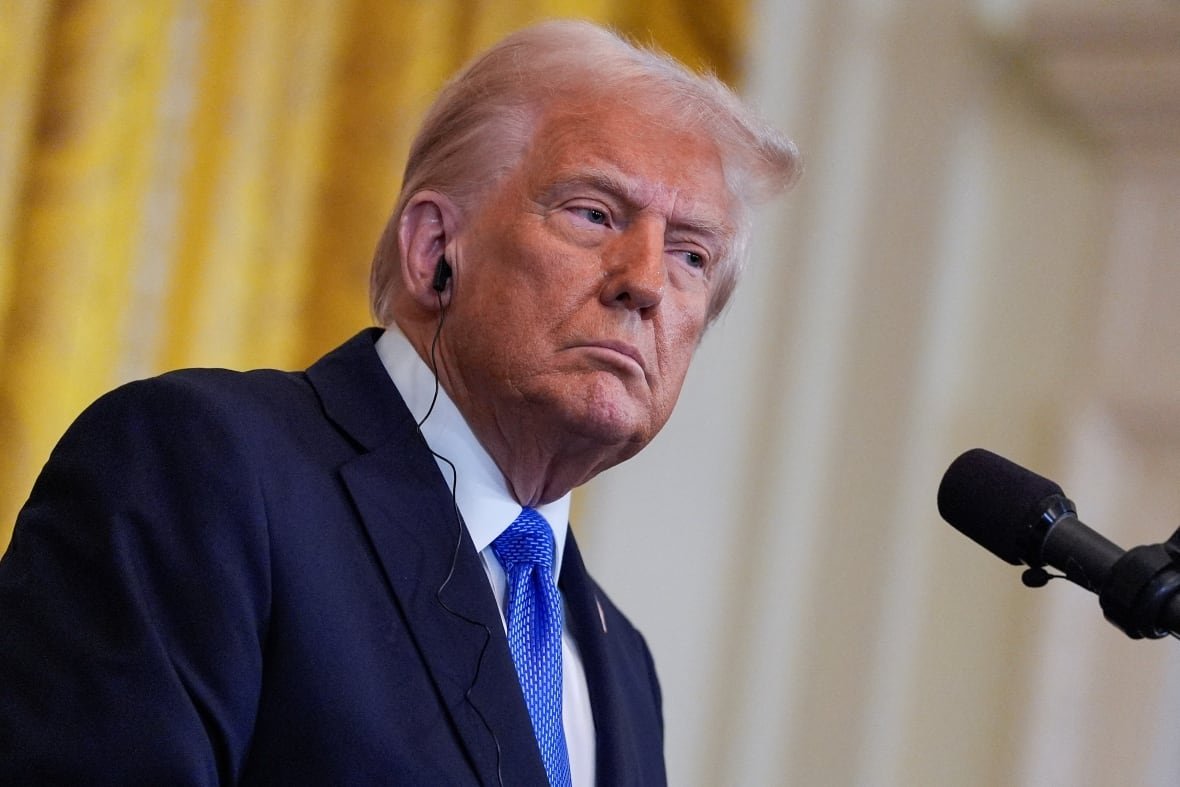 u-s-president-donald-trump-wearing-an-earpiece-during-a-news-conference U.S. President Donald Trump, wearing an earpiece, during a news conference.